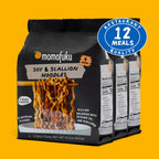 Momofuku Soy & Scallion Noodles packaging on a yellow background with '12 Meals Quality' badge.