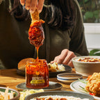 fried chicken dipped into chili crunch hot honey